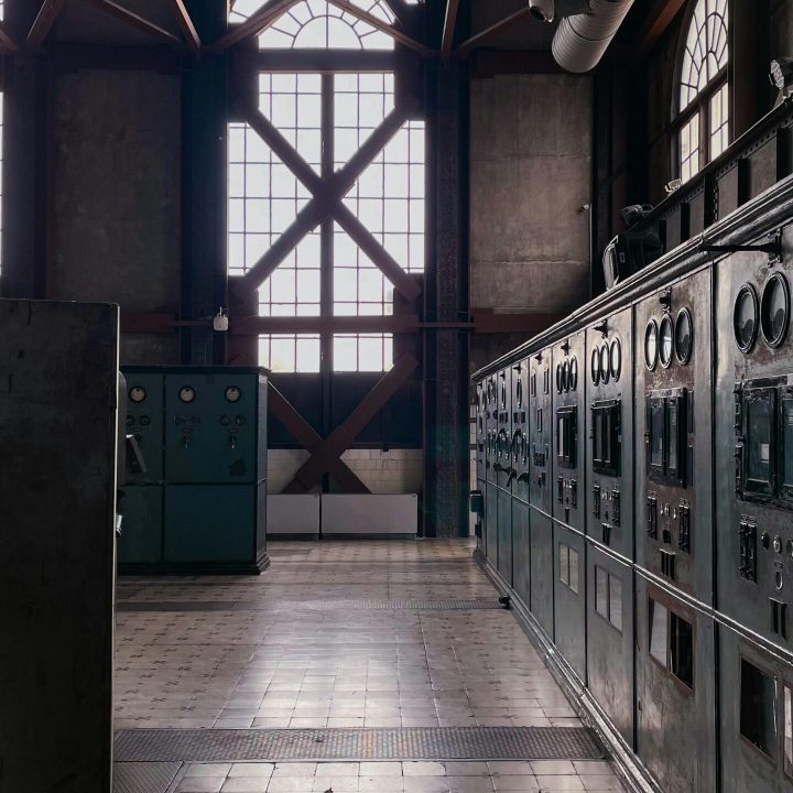 Abandoned industrial plant interior in Istanbul showcasing vintage machinery and architecture.